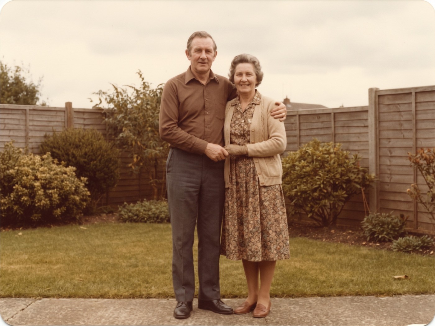 The same two people in one photograph, standing together and holding hands, as if they had been photographed together.